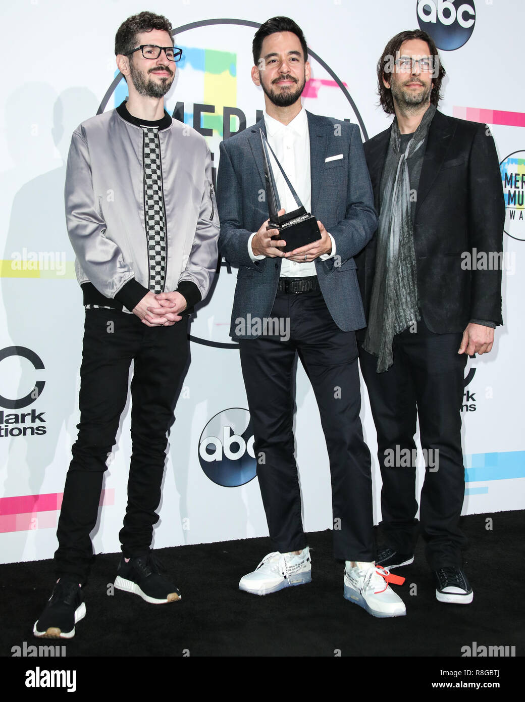 LOS ANGELES, CA, USA - NOVEMBER 19: Brad Delson, Mike Shinoda, Rob Bourdon, Linkin Park in the press room during the 2017 American Music Awards held at the Microsoft Theatre L.A. Live on November 19, 2017 in Los Angeles, California, United States. (Photo by Xavier Collin/Image Press Agency) Stock Photo