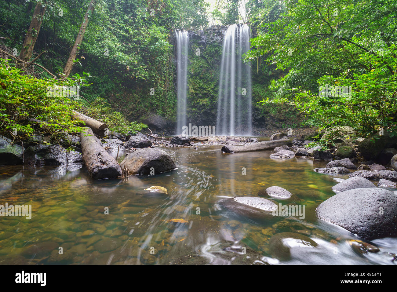 Madai waterfall in the tropical rainforest jungle of Borneo Sabah Malaysia. Stock Photo