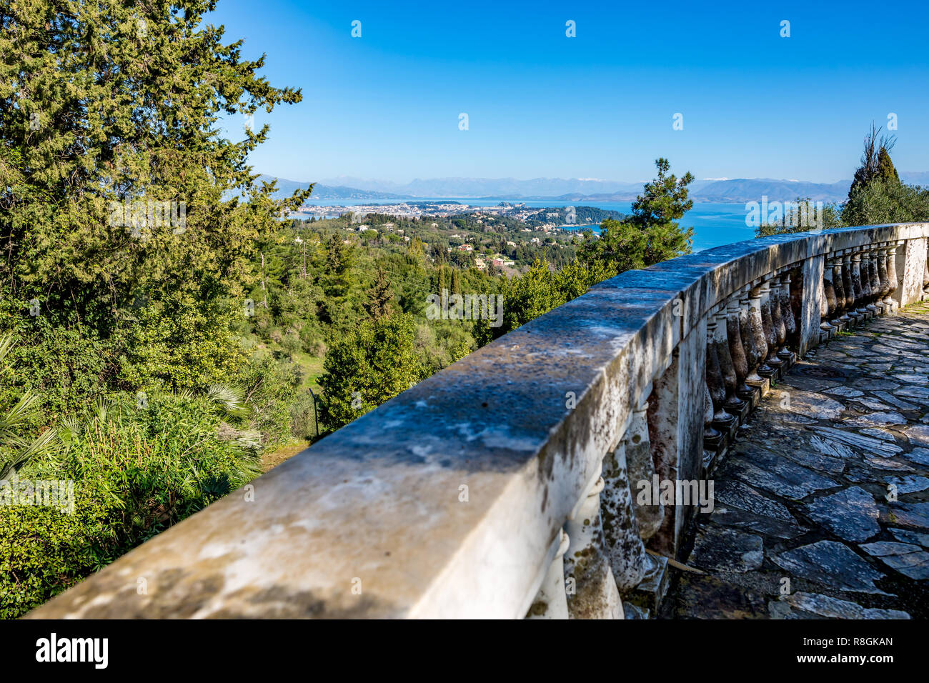 Scenery panoramic landscape view, spring clear blue sky picture from the terrace of Achilleion Museum, Corfu, Kerkira Island, Greece Stock Photo