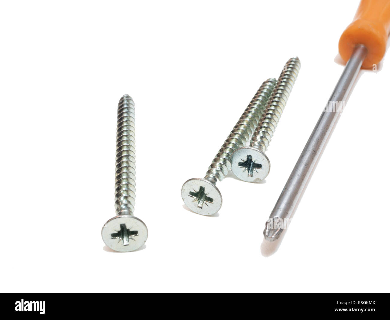 self drilling tapping screws with hex screwdriver isolated on white