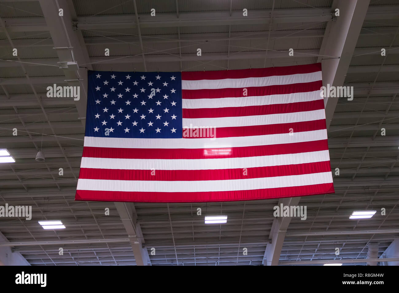 wallpapers Hanging Us Flag Indoors https www alamy com an large american flag hanging from the rafters of an indoor areana image229019081 html