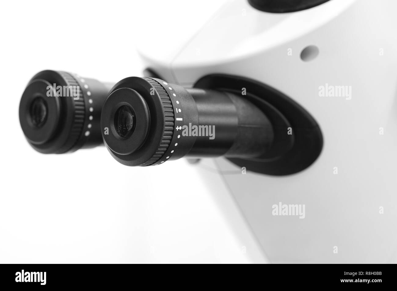Microscope binocular eyepiece close-up Stock Photo