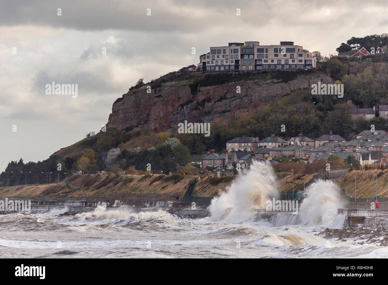 Large waves breaking over the seafront at Colwyn Bay on the North Wales coast Stock Photo