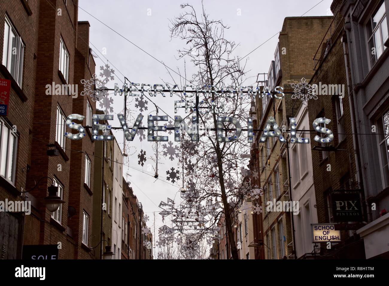 Merry Christmas from Seven Dials lights in Covent Garden, London Stock Photo