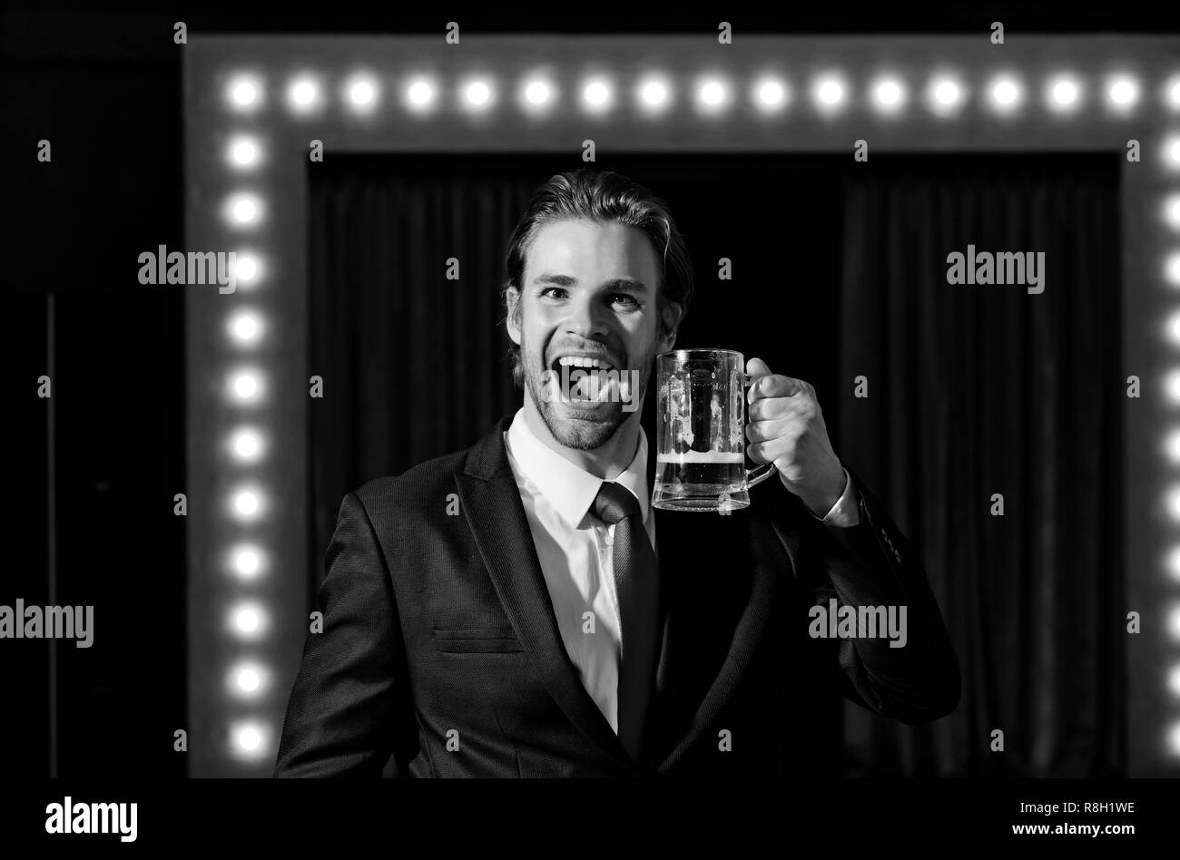 happy man or businessman hold beer glass, meeting and relax Stock Photo