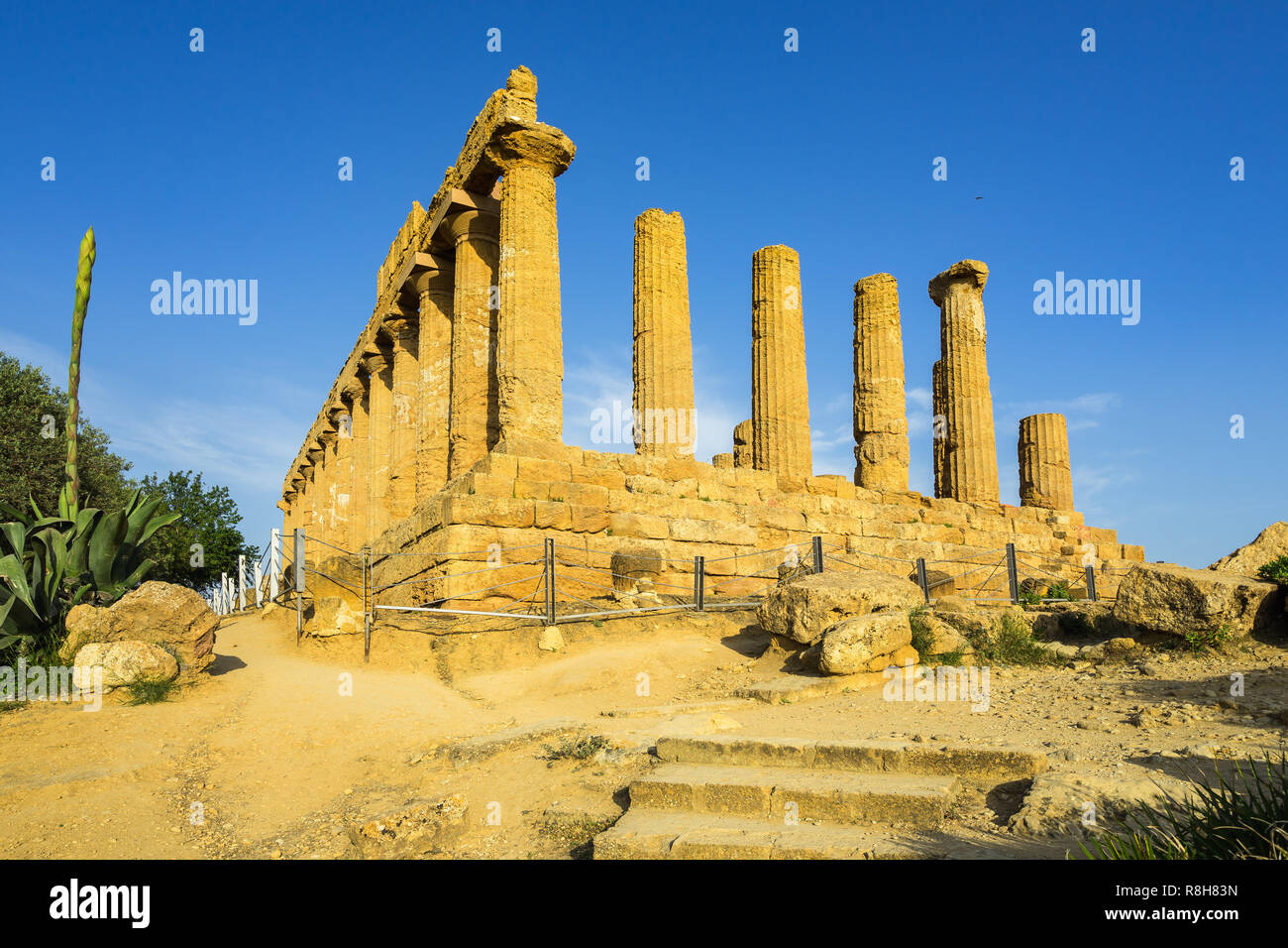 Ruins of Temple of Juno (Giunone) or the Temple of Hera and the characteristic Doric columns at Valle dei Templi, Agrigento, Sicily, Italy Stock Photo