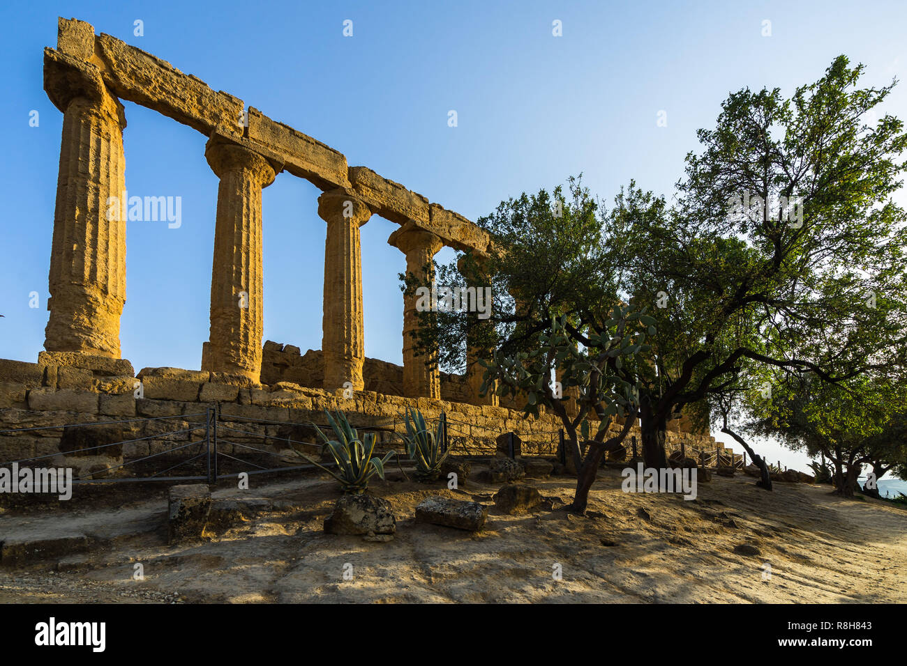 Temple of Juno (Giunone) lighted by late afternoon sunset, Valle dei Templi (Valley of the Temples), Agrigento, Sicily, Italy Stock Photo