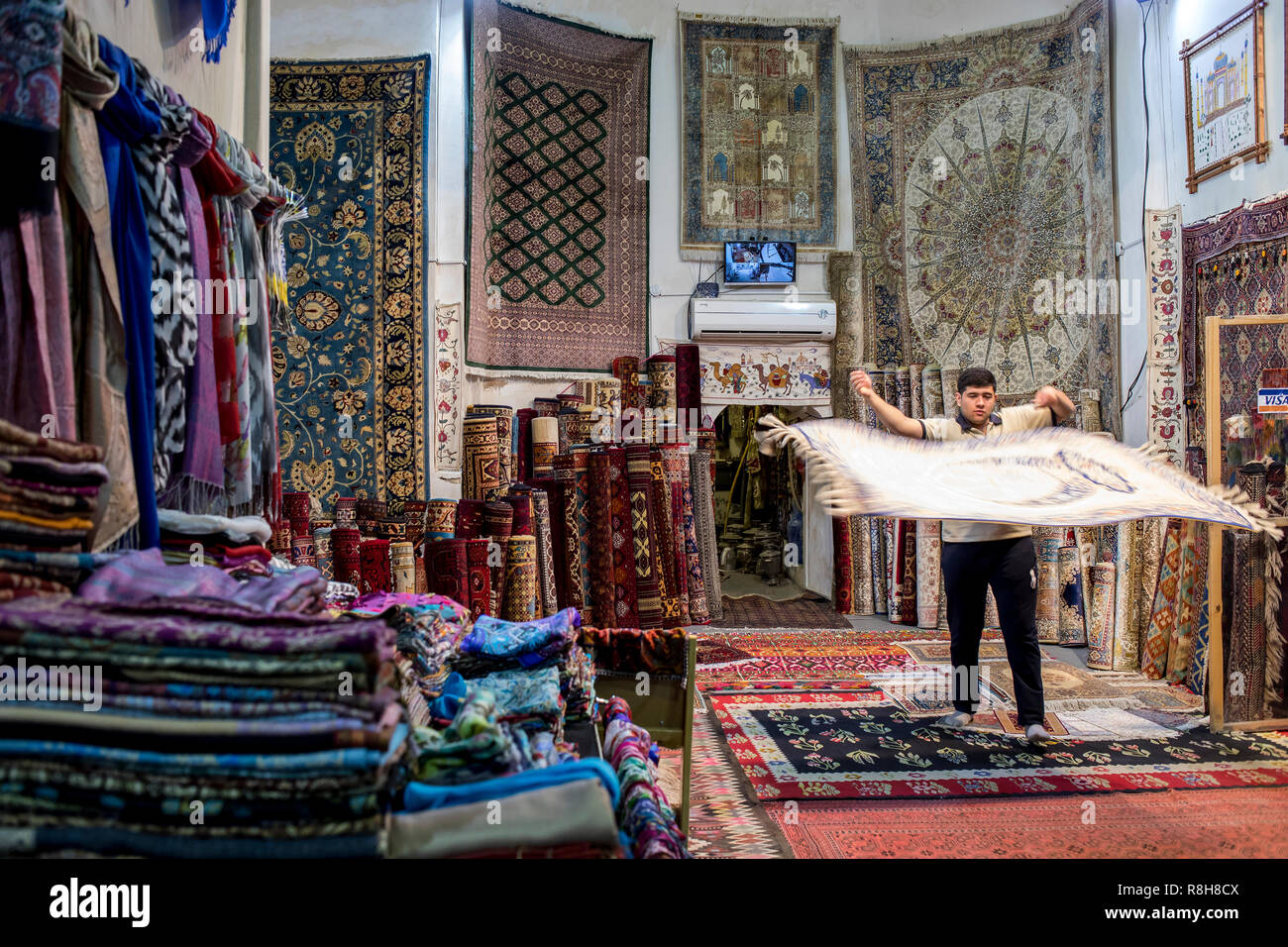 Carpet shop, in Taki Zargaron bazaar, Bukhara, Uzbekistan Stock Photo