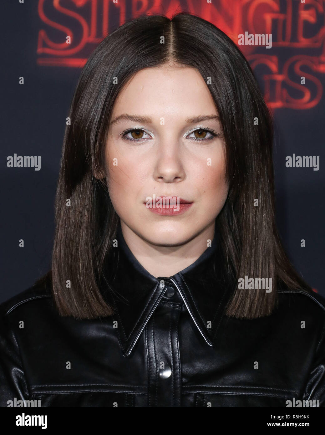 WESTWOOD, LOS ANGELES, CA, USA - OCTOBER 26: Actress Millie Bobby Brown wearing a Calvin Klein dress arrives at the Los Angeles Premiere Of Netflix's 'Stranger Things' Season 2 held at the WESTWOOD, LOS ANGELES, CA, USA - OCTOBER 26: Actress Millie Bobby Brown wearing a Calvin Klein dress arrives at the Los Angeles Premiere Of Netflix's 'Stranger Things' Season 2 held at the