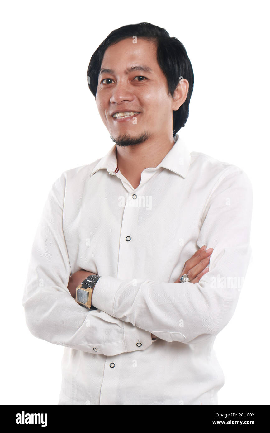 Photo image portrait of a handsome young successful and confident Asian businessman looked very happy and smiling, half body close up portrait with cr Stock Photo