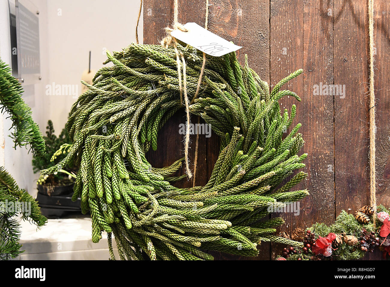 Copenhagen, Denmark. 15th December 2018. Merery christms from bianco shoes  ad christmas wreaths and candle decoration on sale in rodover shoppping  center in Copenhagen Denmark. (Photo. .Francis Joseph Dean / Deanpictures.  Credit: