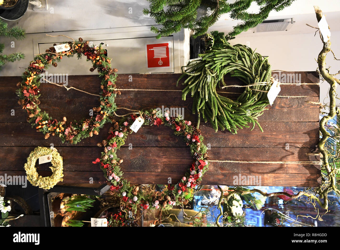 Copenhagen, Denmark. 15th December 2018. Merery christms from bianco shoes  ad christmas wreaths and candle decoration on sale in rodover shoppping  center in Copenhagen Denmark. (Photo. .Francis Joseph Dean / Deanpictures.  Credit: