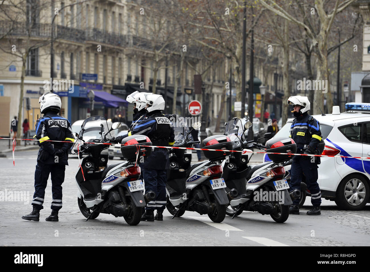 Paris, France, 15th December, 2018. Close-up of two policewomen of the  French mounted police during the "Yellow Vest" demonstration on Place de  l'Opéra. Around 2,000 protesters wearing yellow vests ("Gilets Jaunes")  demonstrated