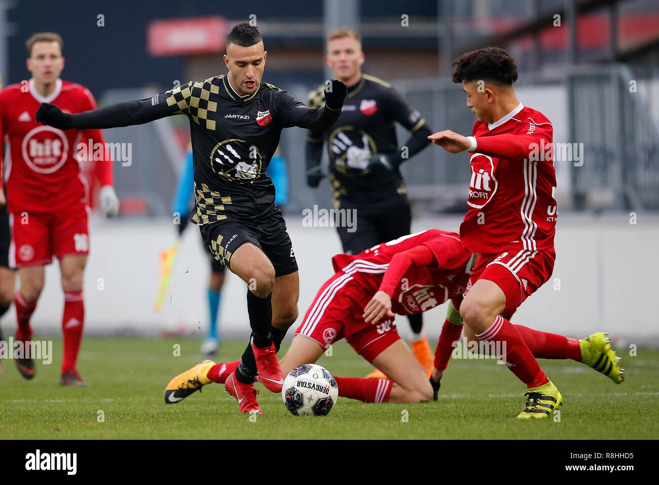 ALMERE, 15-12-2018, Yanmar Stadium, season 2018 / 2019, Dutch Tweede Divisie, Kozakken Boys player Ahmed el Azzouti, Jong Almere City FC player Anwar Bensabouh, Jong Almere City FC player Ruggero Mannes(r) during the match Jong Almere City FC - Kozakken Boys. Stock Photo