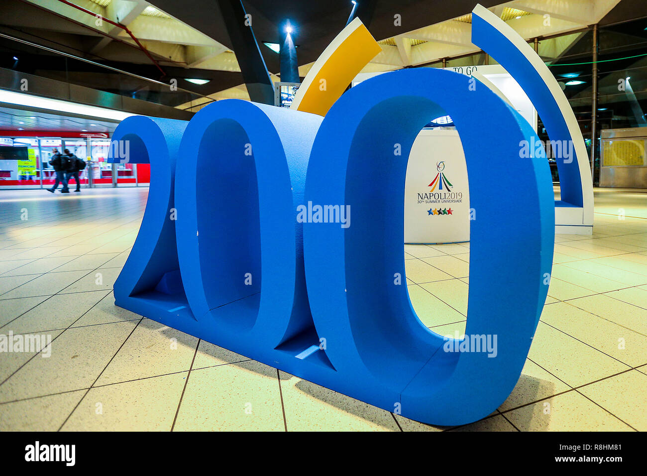 Naples, Italy. 15th December 2018. Napoli Centrale station, The city of Naples is preparing for the 2019 event the Universiade with an information point already active at the central station from 3 July to 14 July in the photo the stand with the writing 200, the days that are missing at the beginning of the event Credit: Antonio Balasco/Alamy Live News Stock Photo
