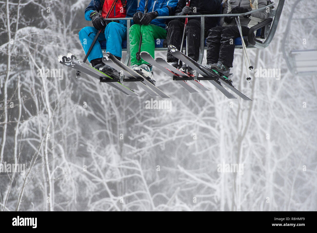 Winterberg Germany 15th Dec 18 Skiers Sit On A Chair Lift In The Winterberg Ski Area And Ride Through The Artificial Snow Of The Snow Cannons In Winterberg In The Sauerland The