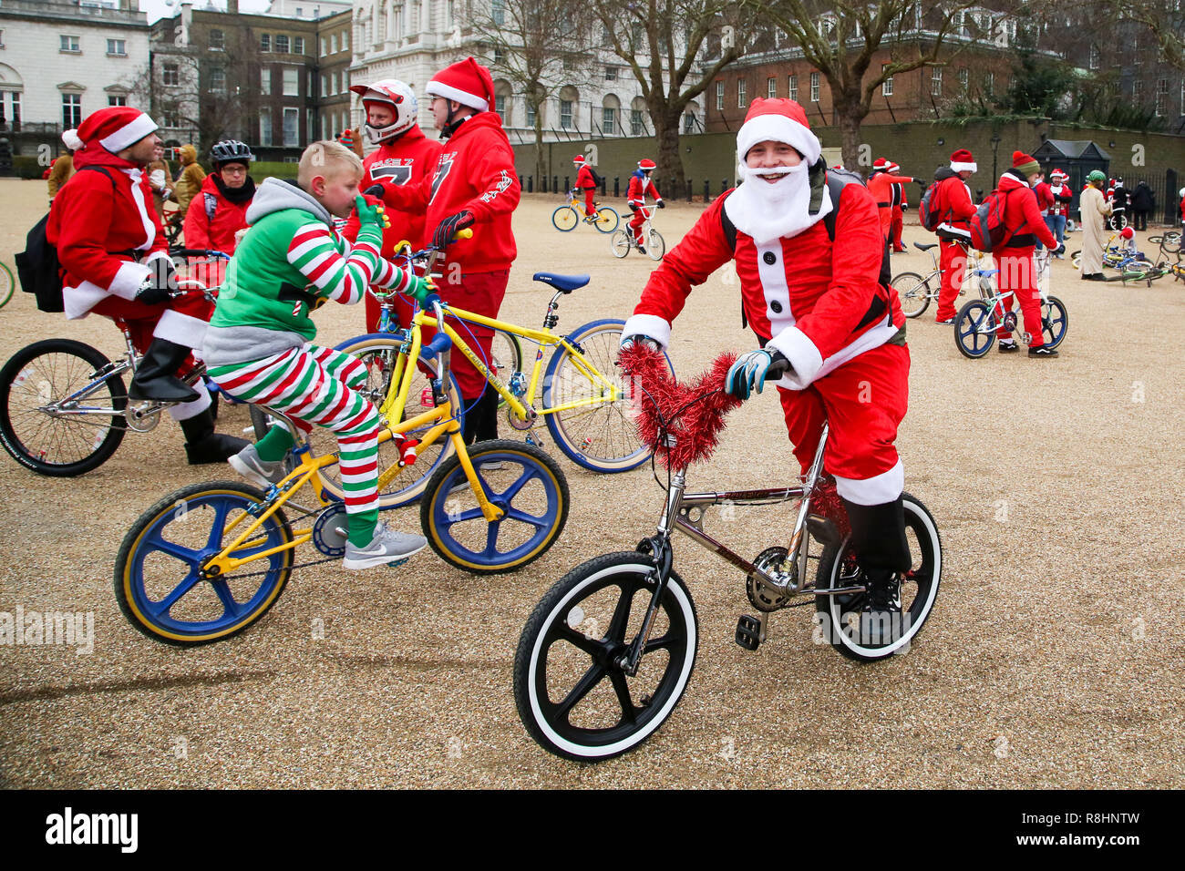 London, UK. 15th Dec, 2018. A man dressed as Father Christmas is seen before cycling during the event.Cycling through London to raise awareness and money for Evelina London Children's Hospital (ECHO), for children with heart conditions. The annual event began four years ago after Stephane Wright's son Tommy, suffered a heart attack and spent time at Evelina London. Tommy was only 6 months old when he suffered a heart attack and nearly died. Fortunately Tommy recovered well but will require further operations as he grows up, so will be returning to the Evelina London in time Stock Photo