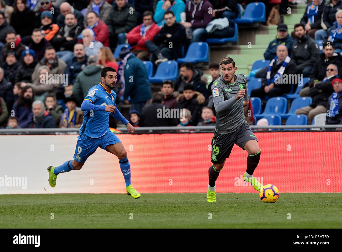 Getafe CF's Angel Rodriguez and Real Sociedad's Theo Hernandez are seen in action during the La Liga football match between Getafe CF and Real Sociedad at the Coliseum Alfonso Perez in Getafe, Spain. ( Final score; Getafe CF 1:0 Real Sociedad ) Stock Photo