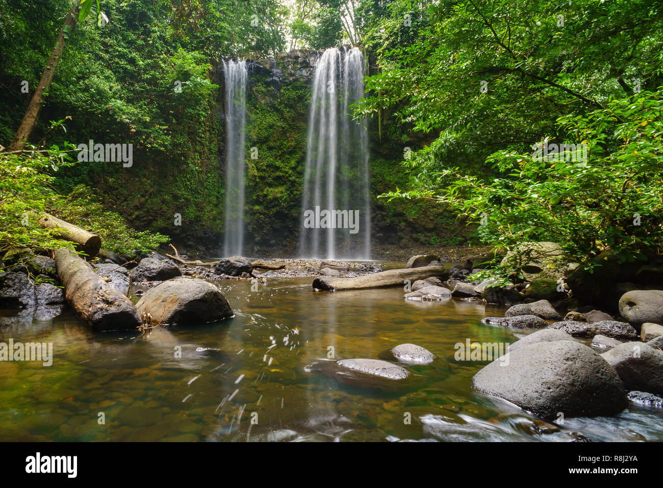 Madai waterfall in the tropical rainforest jungle of Borneo Sabah Malaysia. Stock Photo