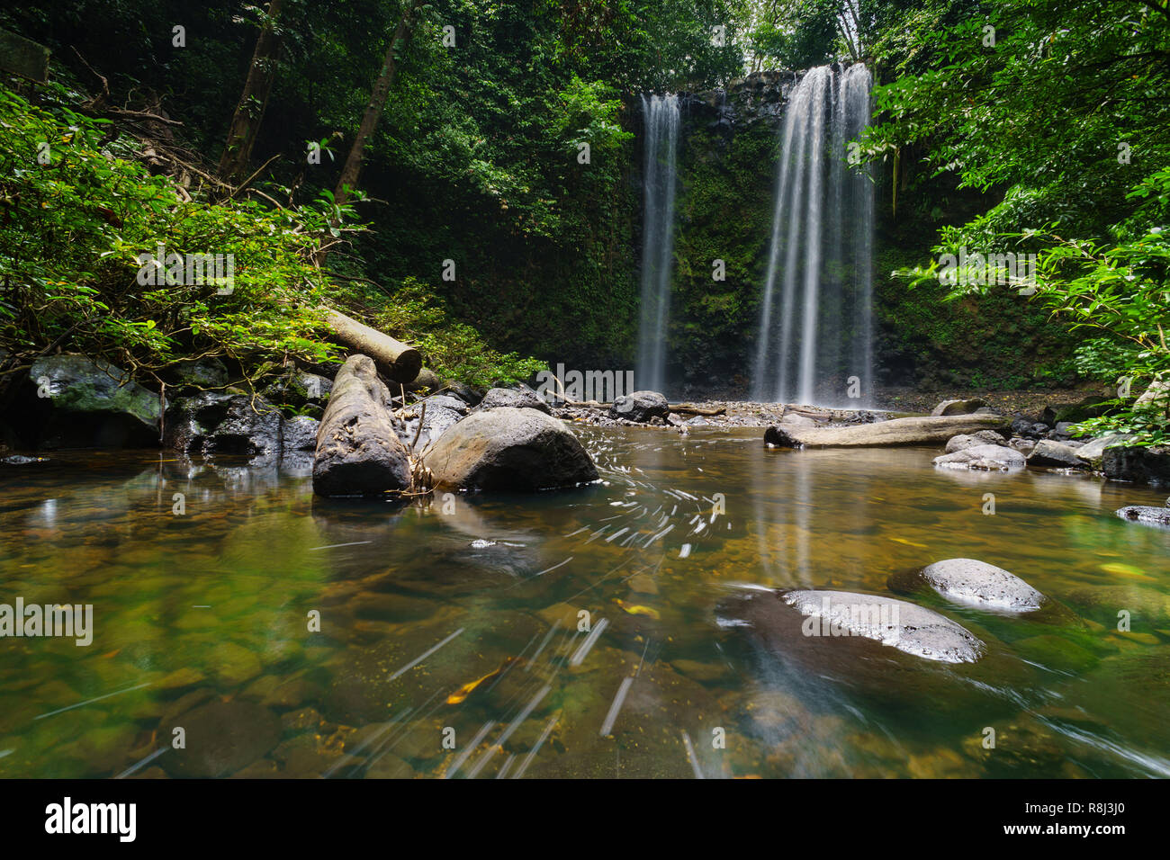 Madai waterfall in the tropical rainforest jungle of Borneo Sabah Malaysia. Stock Photo