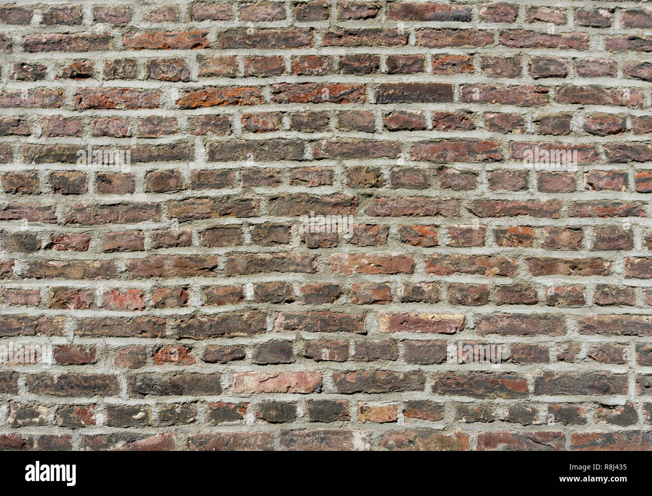 Close-up of a old Stone Brick Wall Stock Photo