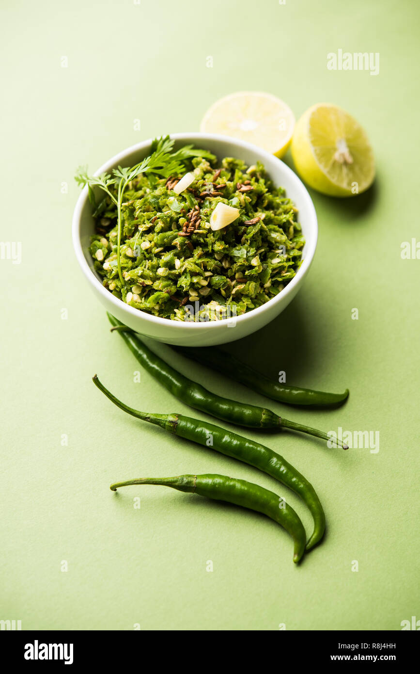 Hot and spicy green chilli chutney using hari mirch, cumin seeds, lemon