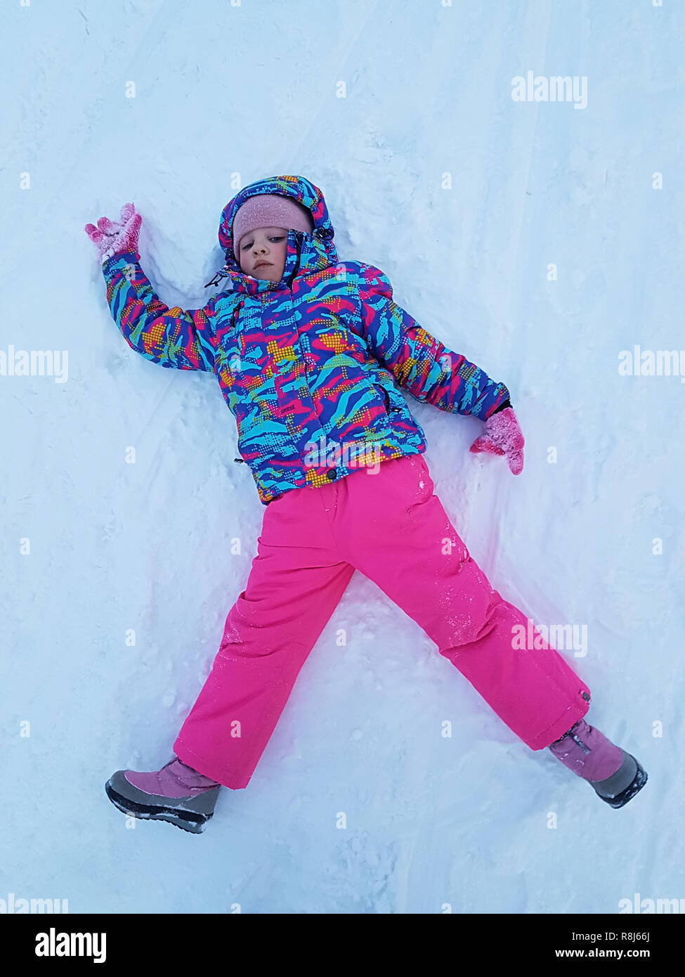 Cute little girl on skis Stock Photo - Alamy