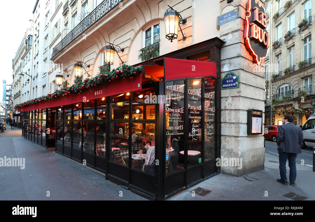 The traditional French cafe Buci decorated for Christmas. It located near Saint Germain boulevard in Paris, France. Stock Photo