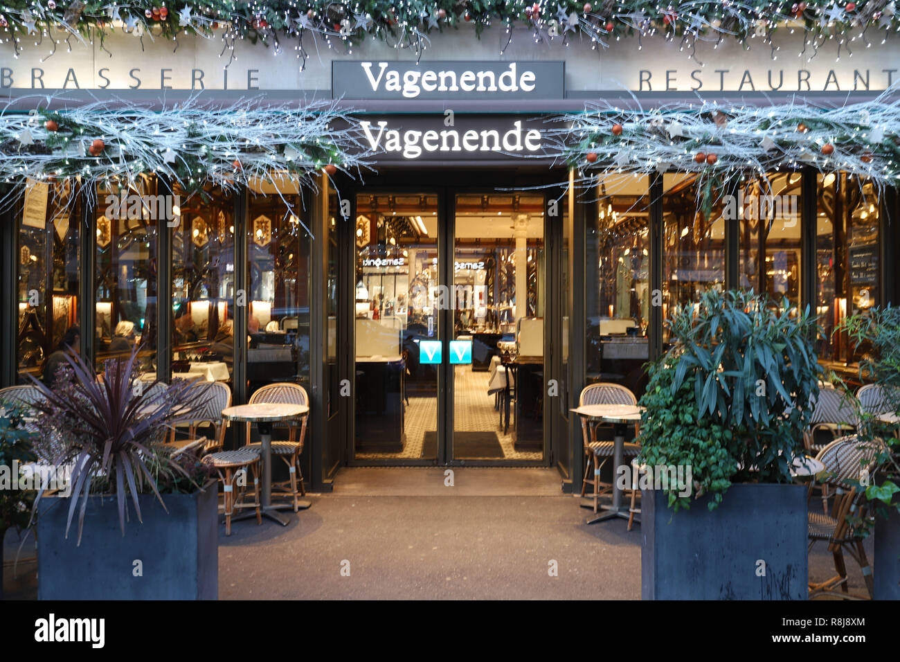 The traditional French restaurant Vagenende decorated for Christmas. It located near Saint Germain boulevard in Paris, France. Stock Photo