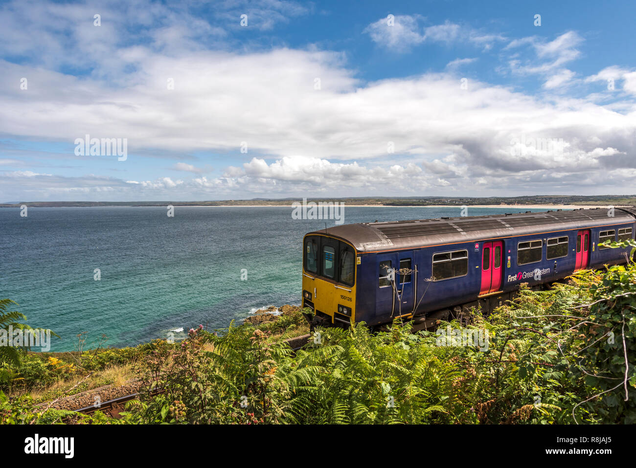 Pretty branch line coastal rail journey between St.Erth and St.ives Cornwall UK Europe Stock Photo