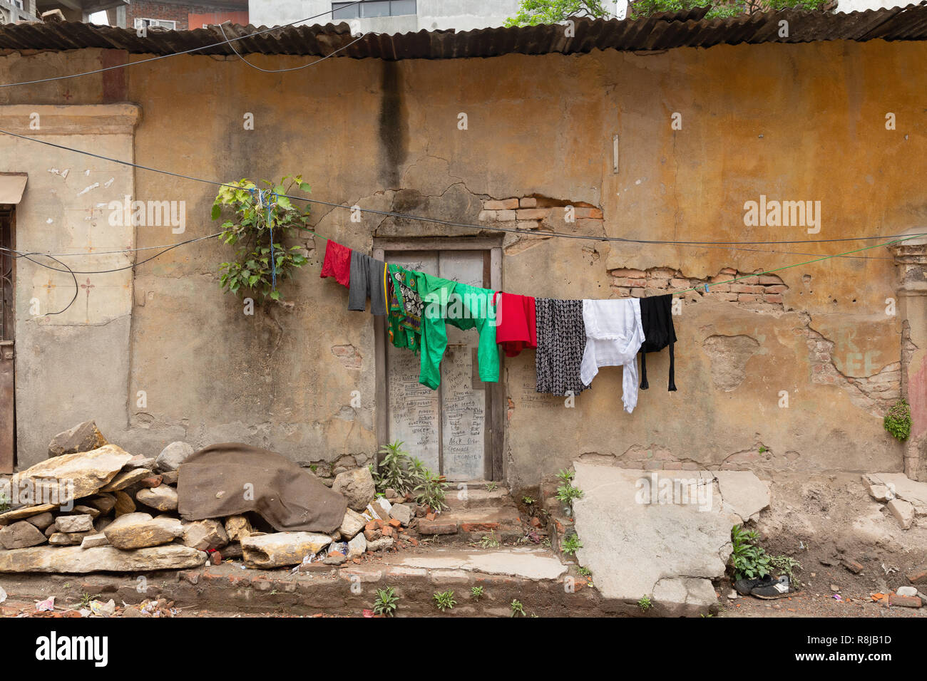 Laundry hanging outside a house in Kathmandu, Nepal Stock Photo