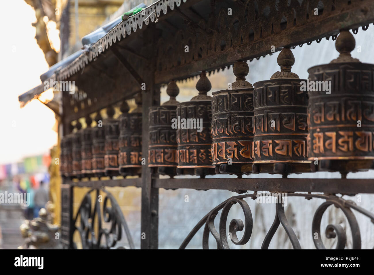 Row of prayer wheels at the Swayambhunath (Monkey Temple), Kathmandu ...