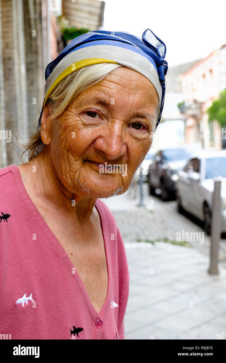 Portrait of old lady in the street Stock Photo