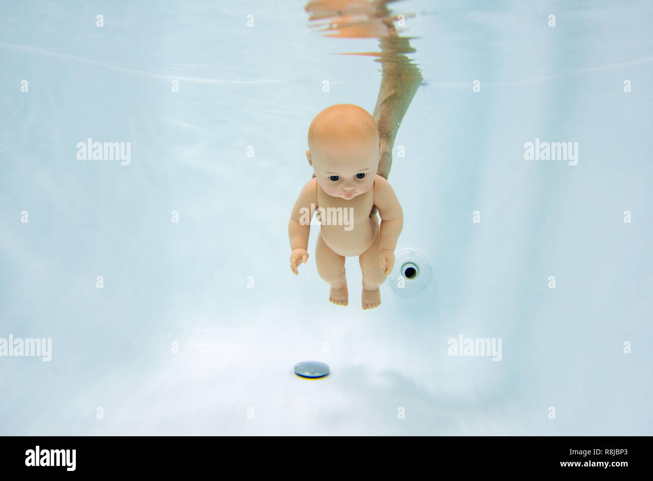 baby doll under water . bathing baby under water Stock Photo Alamy