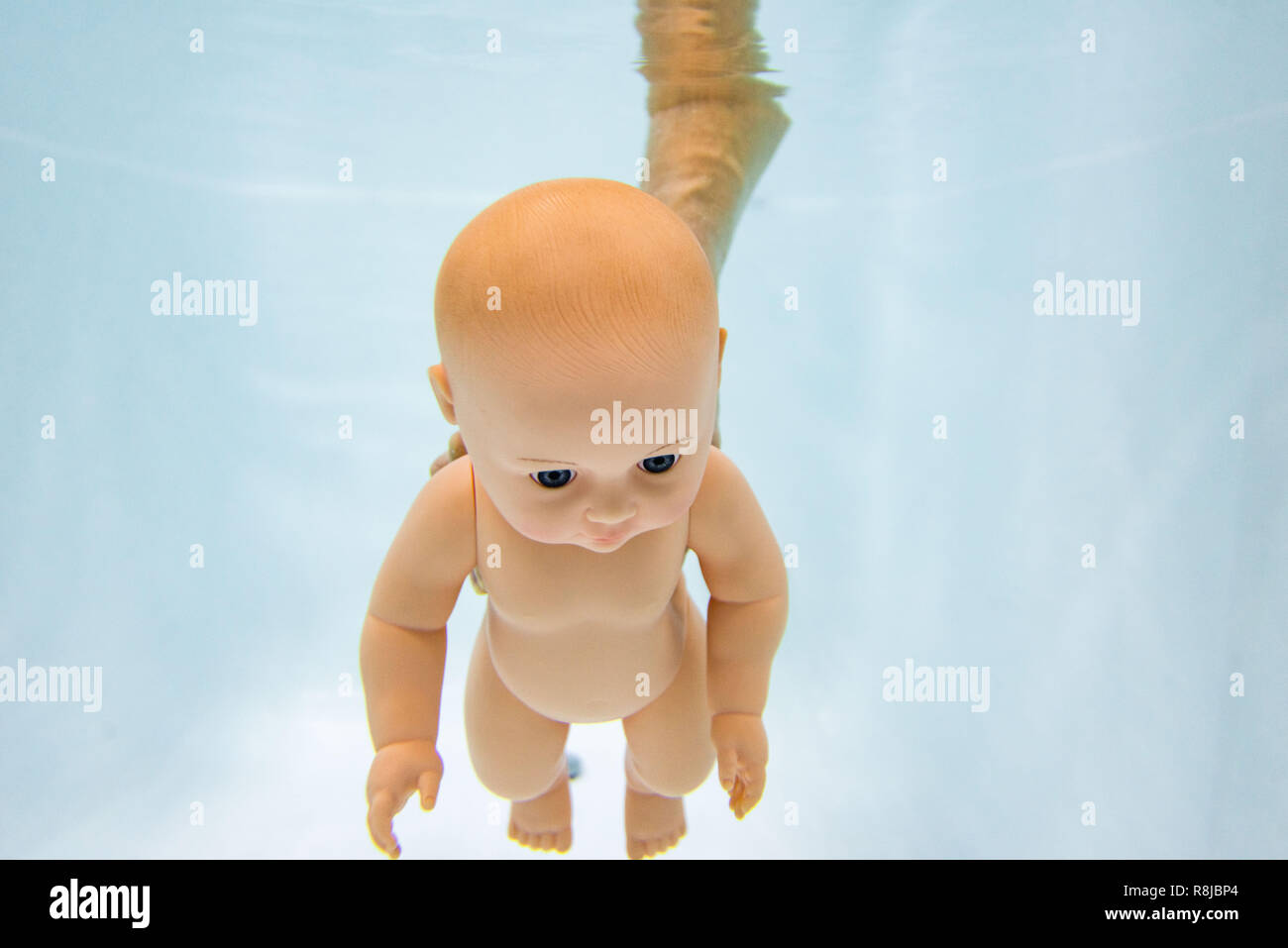 baby doll under water . bathing baby under water Stock Photo Alamy