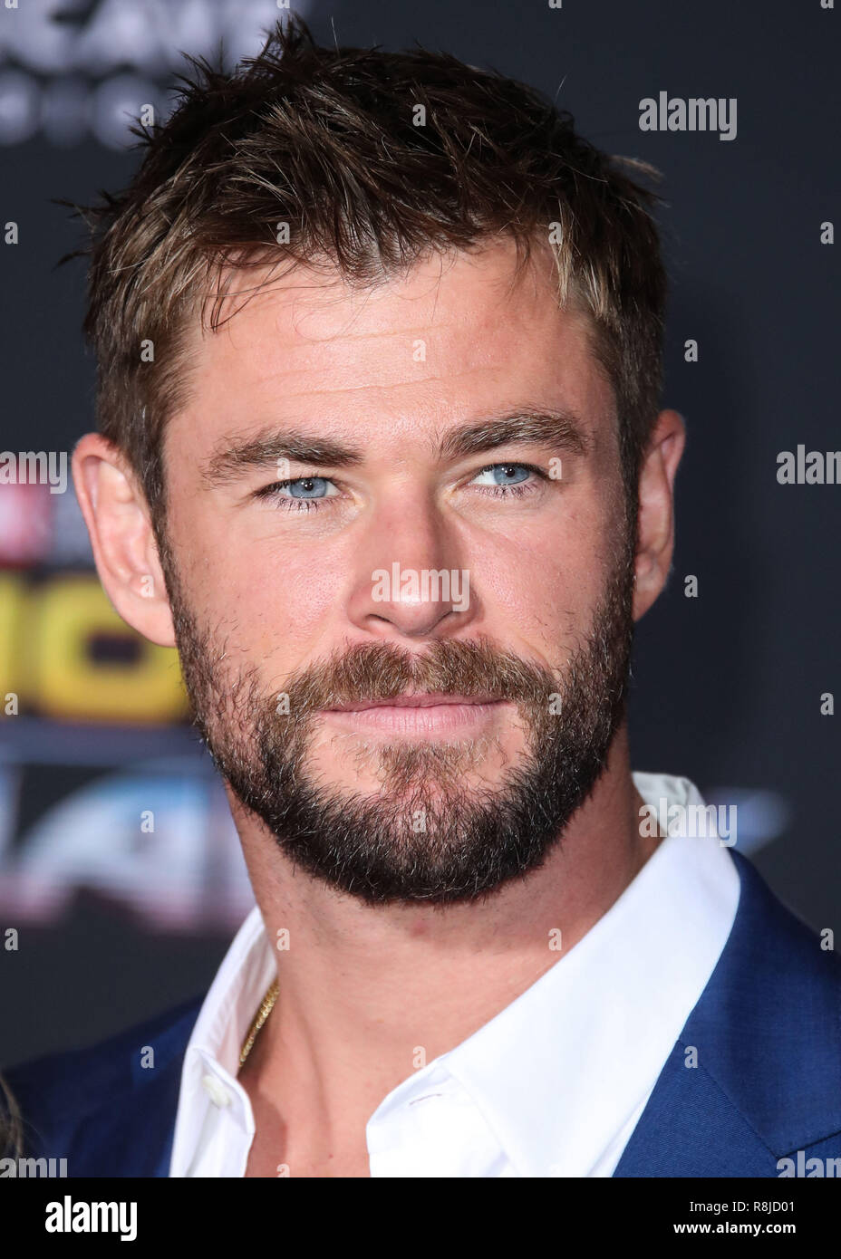 HOLLYWOOD, LOS ANGELES, CA, USA - OCTOBER 10: Actor Chris Hemsworth wearing Hugo  Boss arrives at the Los Angeles Premiere Of Disney And Marvel's 'Thor:  Ragnarok' held at the El Capitan Theatre