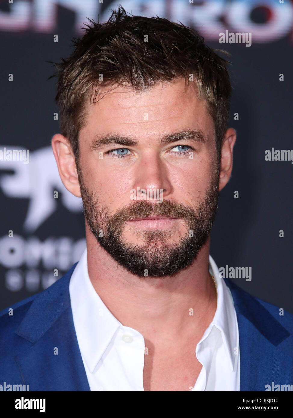 HOLLYWOOD, LOS ANGELES, CA, USA - OCTOBER 10: Actor Chris Hemsworth wearing Hugo  Boss arrives at the Los Angeles Premiere Of Disney And Marvel's 'Thor:  Ragnarok' held at the El Capitan Theatre