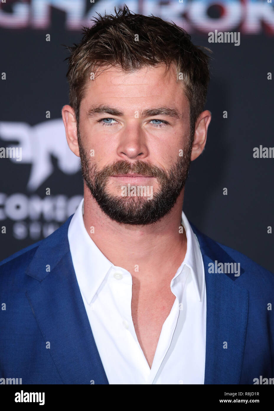 HOLLYWOOD, LOS ANGELES, CA, USA - OCTOBER 10: Actor Chris Hemsworth wearing Hugo  Boss arrives at the Los Angeles Premiere Of Disney And Marvel's 'Thor:  Ragnarok' held at the El Capitan Theatre