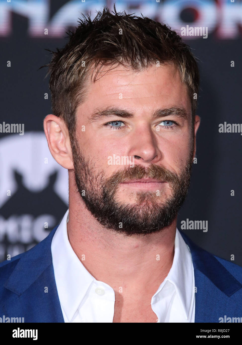 HOLLYWOOD, LOS ANGELES, CA, USA - OCTOBER 10: Actor Chris Hemsworth wearing Hugo  Boss arrives at the Los Angeles Premiere Of Disney And Marvel's 'Thor:  Ragnarok' held at the El Capitan Theatre