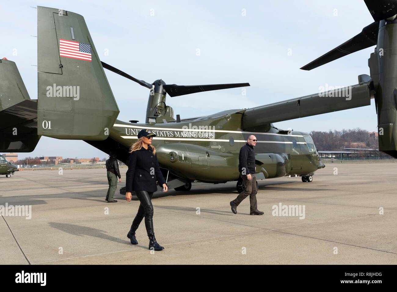 U.S. First Lady Melania Trump wearing a USS George H.W. Bush ball cap hat steps off a Marine Corps V-22 Osprey aircraft at Joint Base Andrews following a holiday visit to the aircraft carrier December 12, 2018 in Andrews, Maryland. Stock Photo