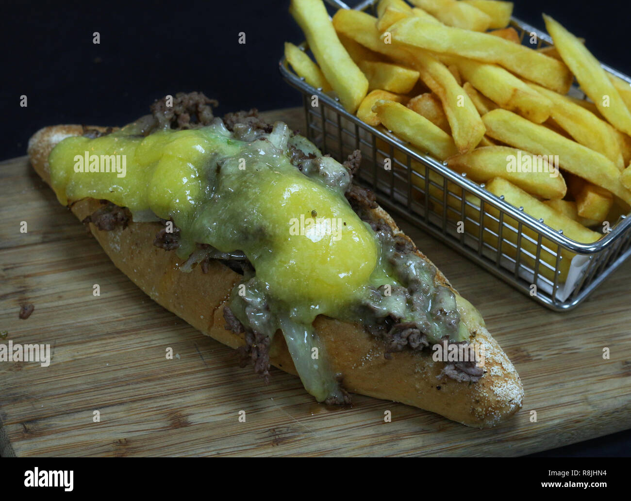 Philadelphia cheese steak with potato fries Stock Photo Alamy