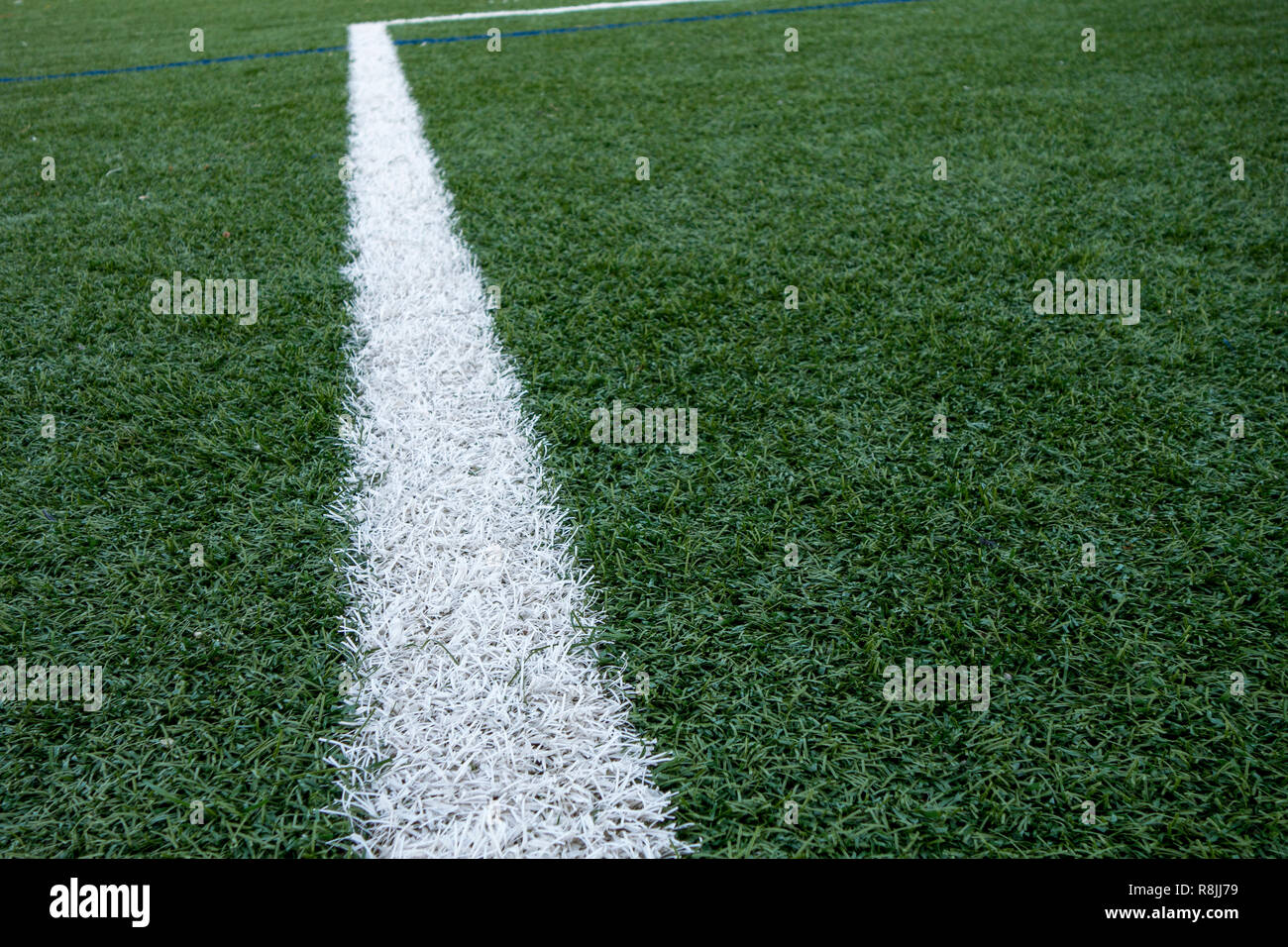 painted white boundary lines of a artficial plastic lawn Stock Photo