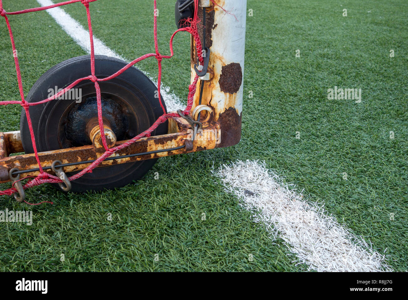 painted white boundary lines of a artficial plastic lawn Stock Photo