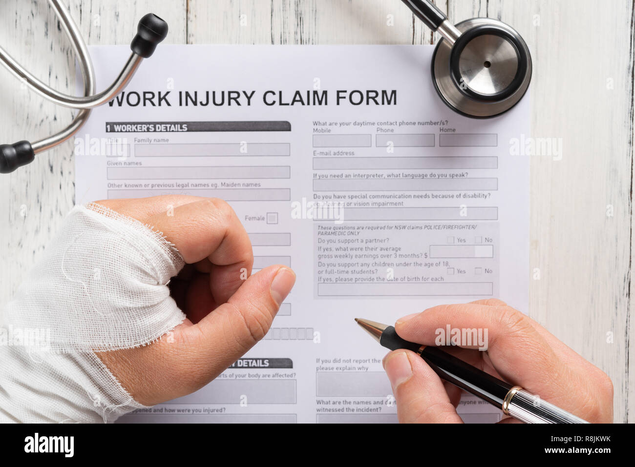 top man up form ... a with work view filling injury claim injury filling form ... a view man with claim top work up
