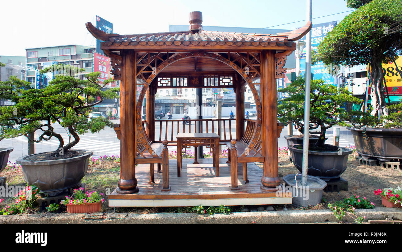 Asian style Wooden gazebo and bonsai trees Stock Photo - Alamy