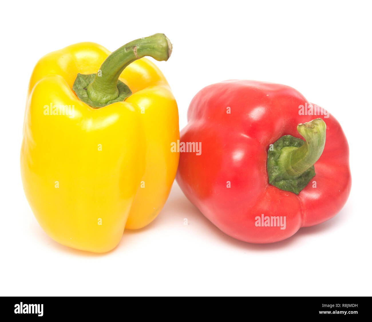 Red and yellow peppers isolated on white background Stock Photo - Alamy
