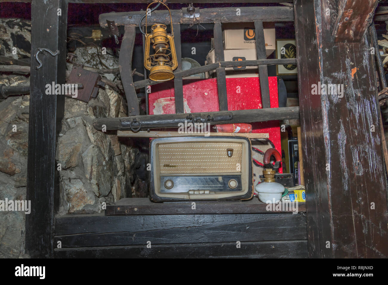 Slavonski Brod, Croatia - Vintage radio, lantern and other stuff stored in the basement Stock Photo