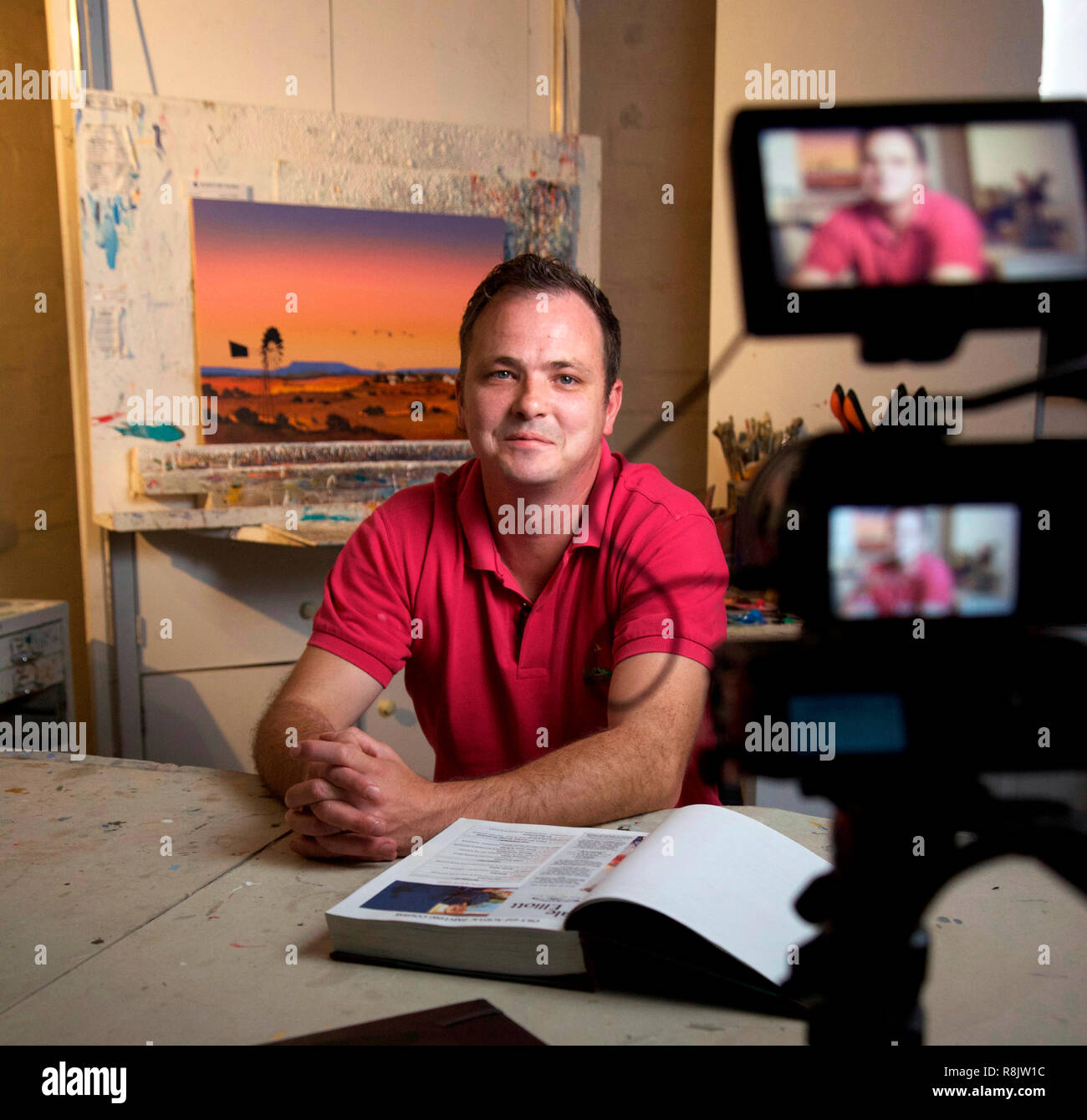 Gallerist Med Elliott of the Dale Elliott Gallery during a documentary film interview in Villiersdorp, Western Cape, South Africa Stock Photo