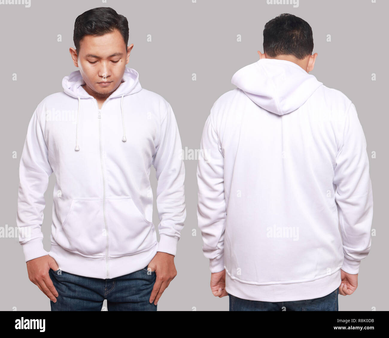 Blank sweatshirt mock up, front, and back view, isolated on grey. Asian male model wear plain white hoodie mockup. Hoody design presentation. Jumper f Stock Photo