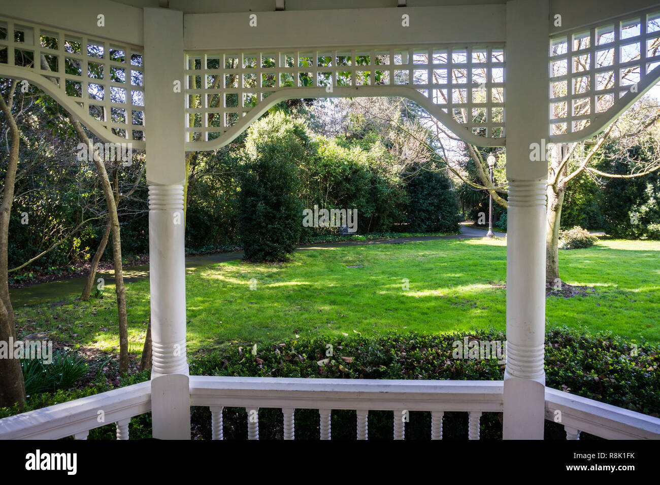Looking out to the surrounding garden from a wooden pavilion; Ardenwood Historic Farm (local public park); east San Francisco bay area, California Stock Photo